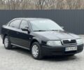 Черный Шкода Октавия, объемом двигателя 1.6 л и пробегом 217 тыс. км за 5200 $, фото 1 на Automoto.ua