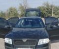 Черный Шкода Октавия, объемом двигателя 2 л и пробегом 259 тыс. км за 6701 $, фото 1 на Automoto.ua