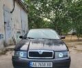 Черный Шкода Октавия, объемом двигателя 1.6 л и пробегом 286 тыс. км за 3999 $, фото 1 на Automoto.ua