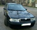 Чорний Шкода Октавія, об'ємом двигуна 1.8 л та пробігом 213 тис. км за 7200 $, фото 1 на Automoto.ua
