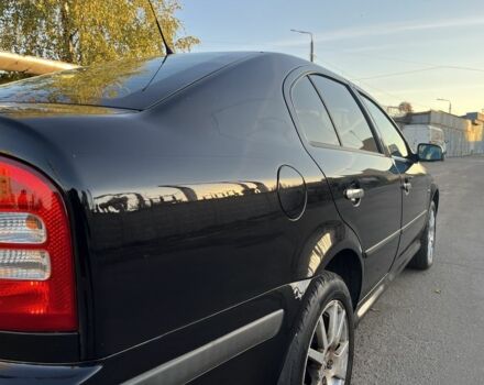 Черный Шкода Октавия, объемом двигателя 1.8 л и пробегом 276 тыс. км за 5500 $, фото 7 на Automoto.ua