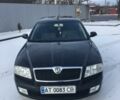 Черный Шкода Октавия, объемом двигателя 1.6 л и пробегом 175 тыс. км за 8500 $, фото 1 на Automoto.ua