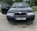Черный Шкода Октавия, объемом двигателя 1.6 л и пробегом 239 тыс. км за 4800 $, фото 1 на Automoto.ua