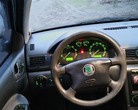 Черный Шкода Октавия, объемом двигателя 1.6 л и пробегом 172 тыс. км за 5600 $, фото 6 на Automoto.ua