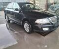 Черный Шкода Октавия, объемом двигателя 1.6 л и пробегом 220 тыс. км за 4300 $, фото 1 на Automoto.ua