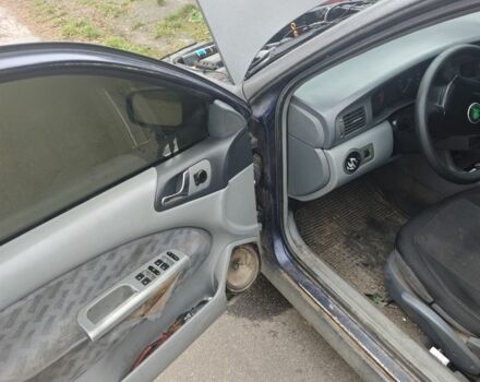 Черный Шкода Октавия, объемом двигателя 2 л и пробегом 354 тыс. км за 700 $, фото 2 на Automoto.ua