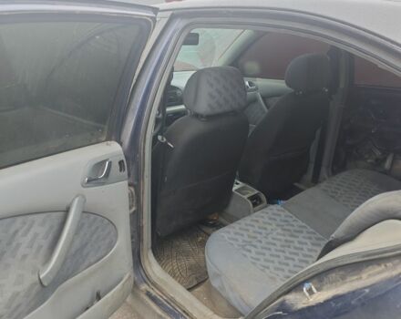 Черный Шкода Октавия, объемом двигателя 2 л и пробегом 354 тыс. км за 700 $, фото 5 на Automoto.ua