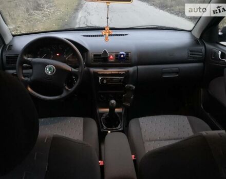 Черный Шкода Октавия, объемом двигателя 1.6 л и пробегом 174 тыс. км за 5500 $, фото 13 на Automoto.ua