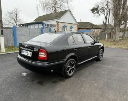 Черный Шкода Октавия, объемом двигателя 1.6 л и пробегом 200 тыс. км за 3850 $, фото 3 на Automoto.ua