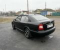 Черный Шкода Октавия, объемом двигателя 1.6 л и пробегом 200 тыс. км за 3850 $, фото 4 на Automoto.ua
