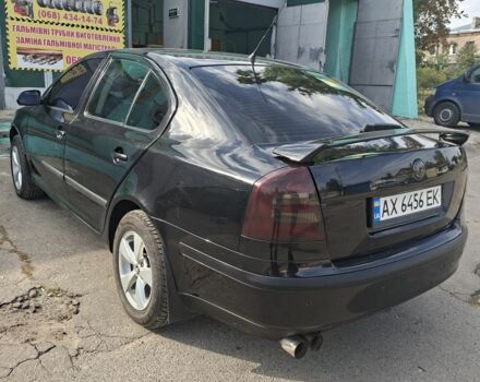 Черный Шкода Октавия, объемом двигателя 1.6 л и пробегом 155 тыс. км за 5300 $, фото 2 на Automoto.ua