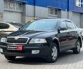 Чорний Шкода Октавія, об'ємом двигуна 2 л та пробігом 233 тис. км за 6990 $, фото 1 на Automoto.ua