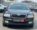 Чорний Шкода Октавія, об'ємом двигуна 2 л та пробігом 233 тис. км за 6990 $, фото 1 на Automoto.ua