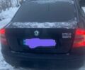 Черный Шкода Октавия, объемом двигателя 1.8 л и пробегом 258 тыс. км за 5000 $, фото 1 на Automoto.ua