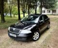 Черный Шкода Октавия, объемом двигателя 1.6 л и пробегом 234 тыс. км за 5800 $, фото 1 на Automoto.ua