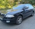 Черный Шкода Октавия, объемом двигателя 1.6 л и пробегом 200 тыс. км за 5900 $, фото 1 на Automoto.ua