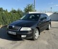Черный Шкода Октавия, объемом двигателя 1.6 л и пробегом 260 тыс. км за 5892 $, фото 1 на Automoto.ua