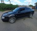 Черный Шкода Октавия, объемом двигателя 1.8 л и пробегом 146 тыс. км за 5950 $, фото 1 на Automoto.ua