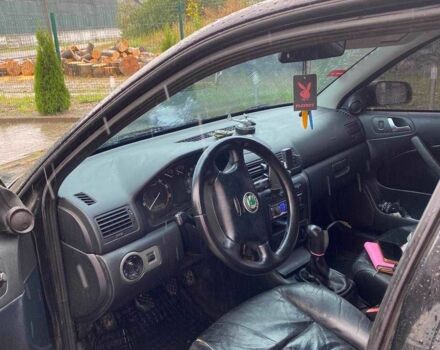 Черный Шкода Октавия, объемом двигателя 1.6 л и пробегом 200 тыс. км за 3800 $, фото 7 на Automoto.ua