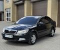 Черный Шкода Октавия, объемом двигателя 1.8 л и пробегом 210 тыс. км за 7300 $, фото 1 на Automoto.ua