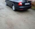 Черный Шкода Октавия, объемом двигателя 1.6 л и пробегом 315 тыс. км за 6500 $, фото 1 на Automoto.ua