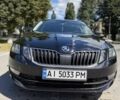 Чорний Шкода Октавія, об'ємом двигуна 1 л та пробігом 160 тис. км за 12042 $, фото 1 на Automoto.ua