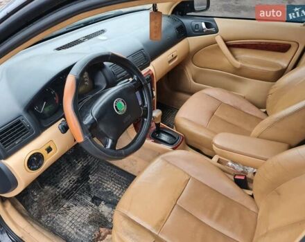 Черный Шкода Октавия, объемом двигателя 1.8 л и пробегом 370 тыс. км за 3500 $, фото 5 на Automoto.ua