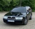 Черный Шкода Октавия, объемом двигателя 1.6 л и пробегом 260 тыс. км за 4700 $, фото 1 на Automoto.ua