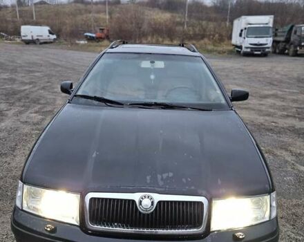 Черный Шкода Октавия, объемом двигателя 1.8 л и пробегом 390 тыс. км за 3999 $, фото 4 на Automoto.ua