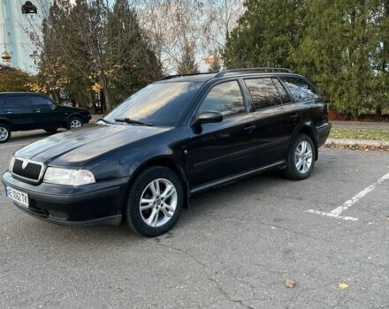 Черный Шкода Октавия, объемом двигателя 1.6 л и пробегом 302 тыс. км за 3900 $, фото 3 на Automoto.ua