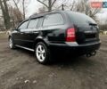 Черный Шкода Октавия, объемом двигателя 1.8 л и пробегом 310 тыс. км за 5999 $, фото 1 на Automoto.ua
