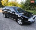 Черный Шкода Октавия, объемом двигателя 1.6 л и пробегом 286 тыс. км за 4350 $, фото 11 на Automoto.ua