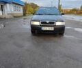 Черный Шкода Октавия, объемом двигателя 1 л и пробегом 302 тыс. км за 1600 $, фото 1 на Automoto.ua