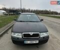 Черный Шкода Октавия, объемом двигателя 1.6 л и пробегом 287 тыс. км за 3500 $, фото 1 на Automoto.ua