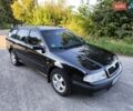 Черный Шкода Октавия, объемом двигателя 1.6 л и пробегом 286 тыс. км за 4350 $, фото 12 на Automoto.ua