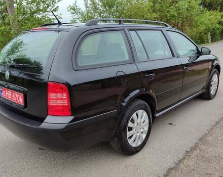 Черный Шкода Октавия, объемом двигателя 1.6 л и пробегом 176 тыс. км за 4700 $, фото 61 на Automoto.ua