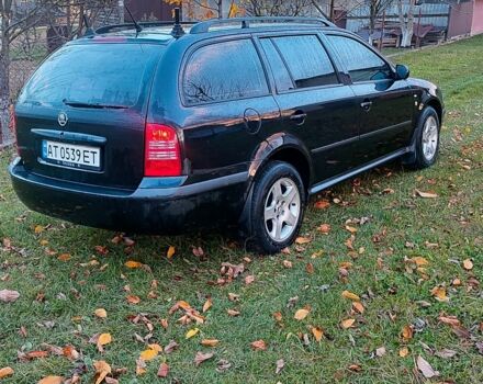 Черный Шкода Октавия, объемом двигателя 1.6 л и пробегом 313 тыс. км за 3850 $, фото 2 на Automoto.ua