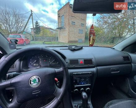 Черный Шкода Октавия, объемом двигателя 1.6 л и пробегом 375 тыс. км за 4600 $, фото 7 на Automoto.ua