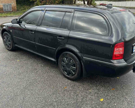 Черный Шкода Октавия, объемом двигателя 1.6 л и пробегом 375 тыс. км за 4600 $, фото 3 на Automoto.ua