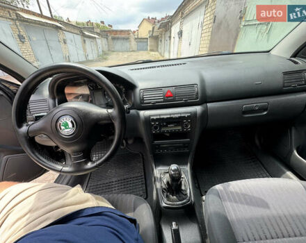 Черный Шкода Октавия, объемом двигателя 1.6 л и пробегом 202 тыс. км за 4200 $, фото 4 на Automoto.ua