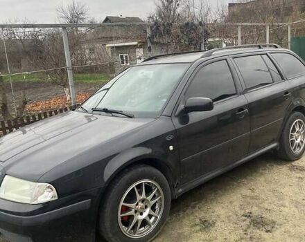 Черный Шкода Октавия, объемом двигателя 1.6 л и пробегом 227 тыс. км за 4200 $, фото 1 на Automoto.ua