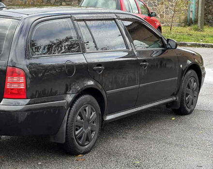 Черный Шкода Октавия, объемом двигателя 1.6 л и пробегом 375 тыс. км за 4600 $, фото 5 на Automoto.ua