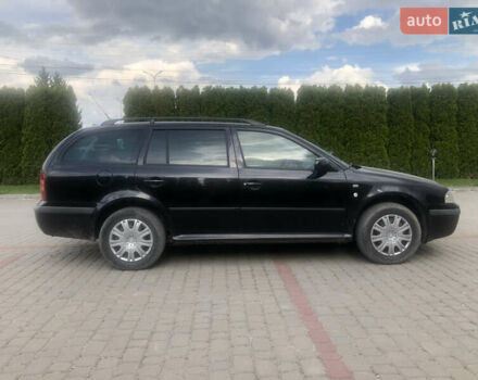 Черный Шкода Октавия, объемом двигателя 1.6 л и пробегом 273 тыс. км за 4900 $, фото 10 на Automoto.ua