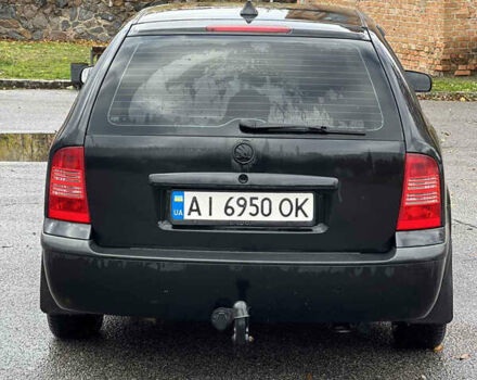 Черный Шкода Октавия, объемом двигателя 1.6 л и пробегом 375 тыс. км за 4600 $, фото 4 на Automoto.ua