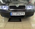 Черный Шкода Октавия, объемом двигателя 2 л и пробегом 275 тыс. км за 4800 $, фото 1 на Automoto.ua
