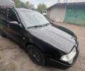 Черный Шкода Октавия, объемом двигателя 2 л и пробегом 241 тыс. км за 6001 $, фото 1 на Automoto.ua