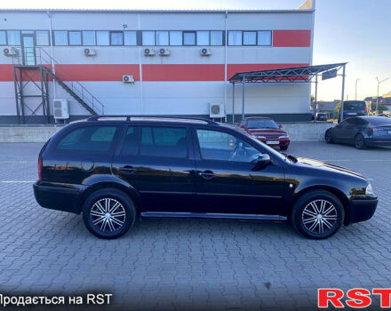 Черный Шкода Октавия, объемом двигателя 1.6 л и пробегом 245 тыс. км за 4950 $, фото 5 на Automoto.ua