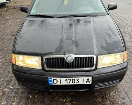 Черный Шкода Октавия, объемом двигателя 1.6 л и пробегом 215 тыс. км за 4800 $, фото 2 на Automoto.ua