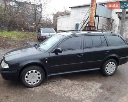 Черный Шкода Октавия, объемом двигателя 1.6 л и пробегом 204 тыс. км за 5200 $, фото 5 на Automoto.ua