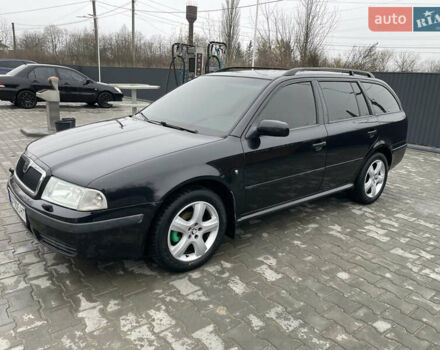 Черный Шкода Октавия, объемом двигателя 1.6 л и пробегом 348 тыс. км за 4200 $, фото 19 на Automoto.ua